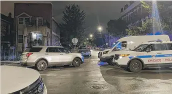  ?? JERMAINE NOLEN/SUN-TIMES ?? A man was killed by Chicago police in a gunfire exchange late Monday in the 1300 block of West 19th Street in Pilsen.