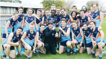  ??  ?? The Ellinbank Distriict Football League under 18 team share the spoils with coach Toby Wallace. The team included William Robertson, Lauchlan Gregson, Lachlan Seppings, Travis Stewart, Riley Sheriff, Justin Lockett, Rhys George, Blake Kahan, Jai...