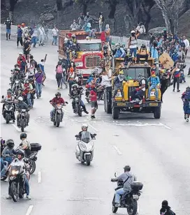  ?? (AP) ?? En Caracas. Opositores camino a la marcha contra el CNE en la capital.