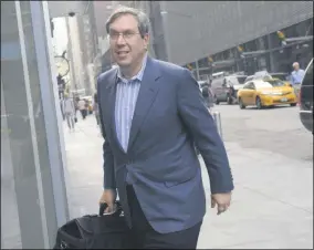  ?? LOUIS LANZANO - THE ASSOCIATED PRESS ?? FILE- In this July 8, 2011, file photo, attorney Jeffrey Kessler enters a Manhattan law office in New York.