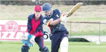  ??  ?? Longwarry’s Blake Kahan plays an aggressive drive during the division one match against Buln Buln.