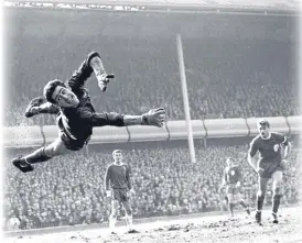  ??  ?? Peter Bonetti was beaten by Brian Tawse’s volley but got a reprieve.