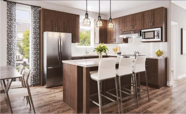  ??  ?? The Sandersons chose the Drake semi-detached bungalow by Tamarack Homes. “It was bright, it was spacious, it wasn’t cramped. It had everything in it that we wanted,” said Sandy Sanderson.