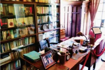  ??  ?? July 18, 2019: A book room in the former residence of Ke Ling (1909-2000), a famous Chinese writer, screenwrit­er and critic, in Shanghai. Every item in the room reflects the personalit­y and preference of its owner. IC