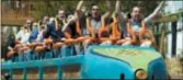  ?? AP PHOTO/TIM LARSEN ?? In this May 19, 2005, file photograph, people cheer at the end of a ride on Six Flags Great Adventure’s roller coaster, Kingda Ka, in Jackson, N.J.