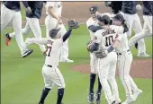  ?? SUE OGROCKI — THE ASSOCIATED PRESS ?? The Astros celebrate their win against the Red Sox in Game 6 of the American League Championsh­ip Series on Friday in Houston.