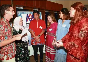  ??  ?? (From left) Arnold, Issa, Lee, Quinn, Soophia and Halfacre sharing a light moment at the showcase held at the Education Technology Division.