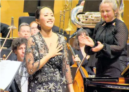  ?? Photo / Supplied ?? Pianist Somi Kim takes a well-deserved bow at the Auckland Philharmon­ia Orchestra concert, Rediscover­y, at the Auckland Town Hall.