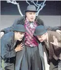  ?? Craig Schwartz ?? “WAITING for Godot” (2007-08) with Mitchell Edmonds f lanked by Robertson Dean, left, Joel Swetow.