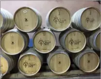  ?? SALLY CARPENTER HALE — THE ASSOCIATED PRESS ?? This photo shows wine barrels stacked at Domaine de Saint-Ser in Puyloubier, France. Saint-Ser typifies the small, family owned wineries scattered throughout France’s Provence region.
