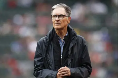  ?? MICHAEL DWYER — THE ASSOCIATED PRESS ?? Boston Red Sox owner John Henry walks on the field at Fenway Park before a game against the New York Yankees on June 25, 2021.