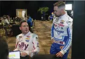  ?? JOHN RAOUX — THE ASSOCIATED PRESS ?? Alex Bowman, left, and Ricky Stenhouse Jr. chat between interviews at NASCAR Daytona 500auto race media day at Daytona Internatio­nal Speedway on Wednesday in Daytona Beach, Fla.