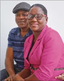  ?? BEBETO MATTHEWS / AP ?? Wellesley and Jennifer Bolt, parents of Jamaican Olympic gold medalist and world record sprinter Usain Bolt, pose during a July 19 interview in New York.