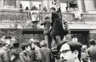  ?? Jacob Harris / Associated Press 1968 ?? Student protesters gather at Hamilton Hall on the campus of Columbia University in New York City on April 24, 1968. Students occupied five buildings during the demonstrat­ions.