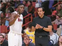  ?? JOHN MCCALL/SOUTH FLORIDA SUN SENTINEL ?? Former Miami Heat guard Victor Oladipo and Heat coach Erik Spoelstra, seen here in 2022, found themselves in an uneasy moment with a gambler last season.