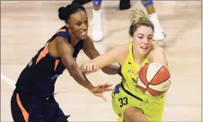  ?? Chris O'Meara / Associated Press ?? Connecticu­t Sun forward DeWanna Bonner, left, knocks the ball away from Dallas Wings guard Katie Lou Samuelson during a WNBA game last year in Bradenton, Fla.