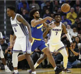  ?? JANE TYSKA — BAY AREA NEWS GROUP ?? The Warriors’ Anthony Lamb passes in the third quarter of a game against the Sacramento Kings at Chase Center in San Francisco on Monday.
