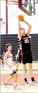  ?? Westside Eagle Observer photograph­s by Randy Moll ?? Blackhawk senior David Andrus, No. 33, shoots under the basket during play against the Pioneers in Gentry on Feb. 5.