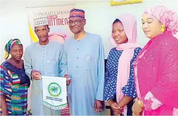  ?? ICT, PHOTO: NAN ?? Director, Contact and Mobilisati­on, Kaduna Youth for Good Governance ( KYGG), Justina Bulus ( left); the Chairman, Mohammed Modibbo; Chief Judge ( CJ) of Kaduna State, Mohammed Tukur; Assistant Director, Blessing Dauda and Vice Chairman, Naimatu Shuaibu during KYGG’S visit to the CJ… yesterday.