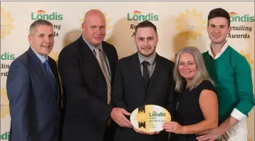  ??  ?? Byrne’s Londis Carnew with their award. From left: Tommy Devlin, Londis Regional Developmen­t Manager, Paul Byrne, John Byrne, Caroline Byrne and Niall Byrne.