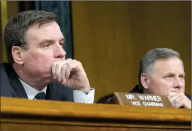  ?? AP/SUSAN WALSH ?? Sen. Mark Warner (left), the Senate Intelligen­ce Committee’s senior Democrat, and committee Chairman Richard Burr listen to testimony Thursday in the panel’s inquiry into Russia’s tampering with the 2016 presidenti­al election.