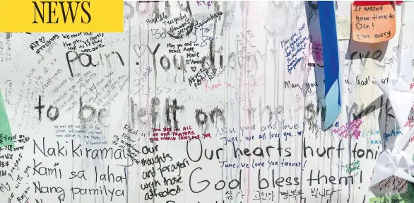  ?? PHOTOS: PETER J THOMPSON / NATIONAL POST ?? Personal notes of condolence are written on a wall on Yonge Street in Toronto for those killed and injured in Monday’s van rampage.