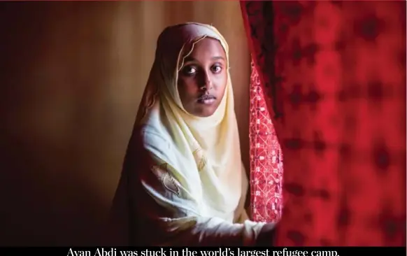  ?? NICHOLE SOBECKI PHOTOS/THE WASHINGTON POST ?? A year ago, Ayan Abdi was one of about 5,000 students who jammed into classrooms in the Dadaab refugee camp for an exam, one step to perhaps the most generous scholarshi­p anywhere.