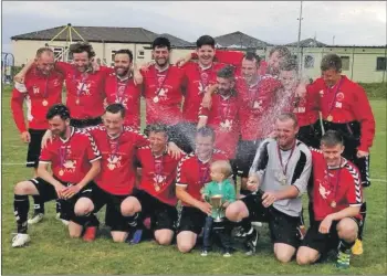  ??  ?? Kyleakin celebrate their GF MacRae Cup victory.