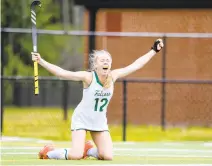  ?? MIKE CAUDILL/FREELANCE ?? Cox’s Zella Bailey, coach Taylor Rountree’s daughter, drops to her knees after scoring the winning goal on a penalty stroke in overtime to beat Stafford for the Class 5 state championsh­ip Saturday at Kellam High.