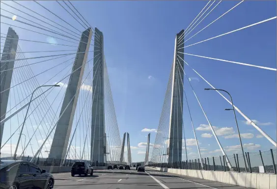  ?? Photos by Will Waldron / Times Union ?? Driving eastbound on the Governor Mario M. Cuomo Bridge carrying I-287 across the Hudson River in Tarrytown, N.Y.