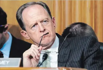  ?? JACQUELYN MARTIN THE ASSOCIATED PRESS ?? Sen. Patrick Toomey of Pennsylvan­ia listens during a committee hearing on tariffs. Ketchup is on Canada’s tariff hit list, and that has Toomey worried because Kraft Heinz is headquarte­red in Pennsylvan­ia.