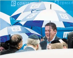  ?? NATHAN DENETTE THE CANADIAN PRESS ?? Federal Conservati­ve leader Andrew Scheer arrives during a campaign stop at District Bagel in Montreal on Thursday.