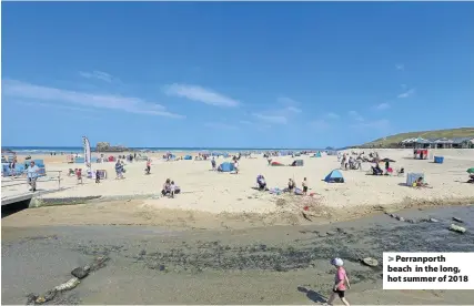  ??  ?? Perranport­h beach in the long, hot summer of 2018