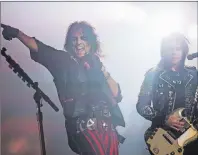  ?? AP PHOTO ?? In this Nov. 6, 2015 file photo, Alice Cooper, left, performs at Wembley Arena in London. Concert industry executives say nostalgia acts are still reliable sellers, with satellite and classic rock radio keeping their hits alive.