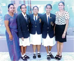  ??  ?? Team in uniform (L2R) Mrs. Asiri, Hiruni, Grace, Hasini, Ms.Jayani