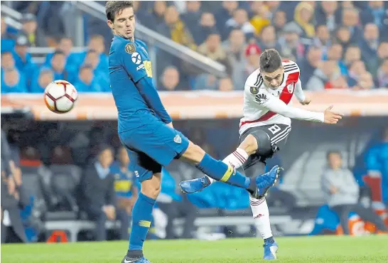  ?? Ap ?? el gol de Quintero en el Bernabéu, donde se jugó la segunda final tras la suspensión por incidentes en el Monumental