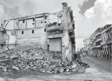  ?? PICTURE ALLIANCE dpa/picture-alliance/Sipa USA ?? A partially collapsed house stands in the center of Havana on March 18, 2023.