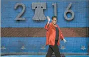  ?? SHAWN THEW/EPA ?? Marcia Fudge, chairwoman of the Democratic National Convention, walks by a blue backdrop, a calming color.