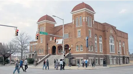  ??  ?? HISTORIC SITE: Birmingham’s 16th Street Baptist Church, where in 1963 a bomb killed four young girls attending Sunday school, remains the home of a thriving congregati­on today.