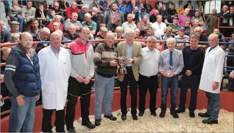  ??  ?? Supreme Champion at the Autumn Born Weanling Show and Sale Sponsored by Boherbue Co-Op Creameries in July 2016. Winner Michael Fleming Cullen with his family, Declan O Keeffe and Patie Murphy Boherbue Co-Op Creameries, Judges Matt Bluitt and Peter O...