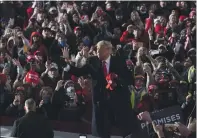  ?? ALEX BRANDON — THE ASSOCIATED PRESS ?? President Donald Trump throws a hat to supporters at a campaign rally at Pittsburgh-butler Regional Airport on Saturday in Butler, Pa.