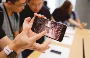  ?? REUTERS PIC ?? The iPhone XS is up to US$200 more expensive than last year’s already pricey iPhone X and represents one of the smallest advances in the product line’s history.