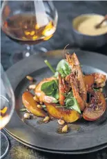  ??  ?? Brown butter fried prawns melt in the mouth when paired with brandy