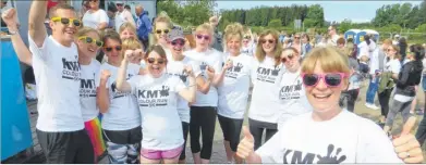  ??  ?? Lianne Morsley and supporters from Aldington Primary School, Ashford, took part in the KM Colour Run at Betteshang­er Park