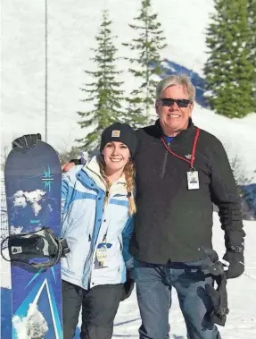  ?? ALEX NEAL ?? Alex Neal, 21, snowboards with her father, Mark David Neal, 62, in January. Her father died as a result of the coronaviru­s in April after a five-week struggle with the disease. It’s painful to hear people say the virus is a hoax, she said.