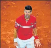  ?? AFP ?? Novak Djokovic reacts while playing Matteo Berrettini.