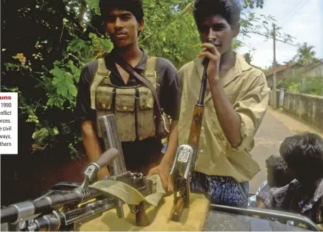 ??  ?? Young guns Tamil fighters in 1990 during their 26-year conflict with government forces. Religion shaped the civil war in important ways, argues Alan Strathern
