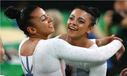  ??  ?? Ellie and Becky Downie embrace at the Rio 2016 Olympics. Photograph: Alex Livesey/Getty Images