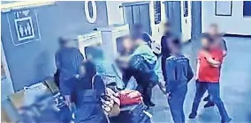  ?? ?? ●●A still taken from video footage of the scenes leading up to a victim being kicked in the head at Manchester Airport