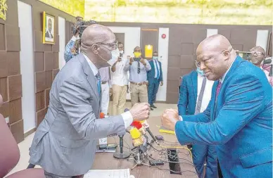  ??  ?? Godwin Obaseki (l), governor, Edo State, with Osarodion Ogie, Secretary to the State Government (SSG), after Ogie’s swearing in as SSG, at Government House, Benin City, yesterday.